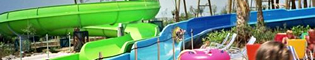 Barracudas: Baja a bordo de un flotador por estos divertidos toboganes caribeños en PortAventura Aquatic Park. Divertidos y veloces como las auténticas barracudas.