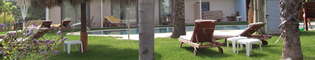 Club San Juan: Edificio y habitaciones con servicios exclusivos de 5 estrellas.